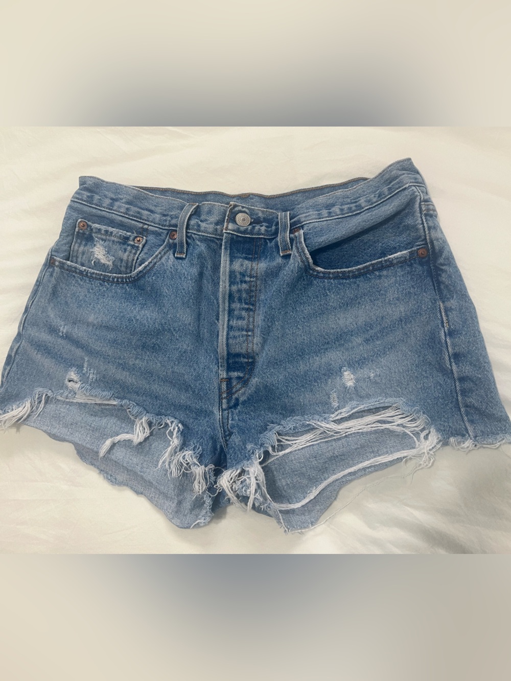 Levi's Distressed Light Blue Denim Cutoff Shorts
